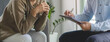 © Pormezz - mental health treatment concept. Stressed asian patient talking with personal psychologist in therapist session have a burnout in work at clinic in office room.