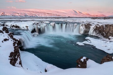 Wall Mural - godafoss waterfall at sunset in winter, iceland.