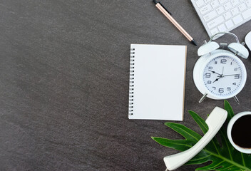 Wall Mural - Office desk with computer, Pencil, spectacles, and a notebook A cup of coffee on a wood background, Top view with copy space, Make a mock-up.