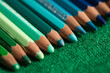 © Milou Dirks - close up macro of colored pencils in green and blue