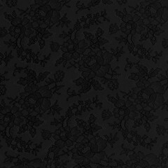 black lace fabric with a floral ornament. luxury background in vintage style.