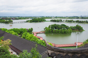 Wall Mural - jiangtian jinshan temple scenic area lake and buildings