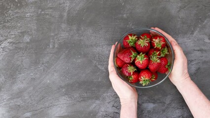 Wall Mural - Serving a Bowl of Strawberries