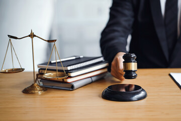 Wall Mural - Lawyer working on a document in the office. Legal law, advice and justice concept.