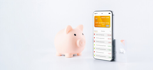 E banking concept. Mobile phone with internet online bank app. Pig bank with credit card on white background. Online wallet save money.