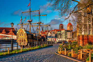 Wall Mural - Beautiful architecture of Gdansk old town reflected in the Motlawa river at sunrise, Poland