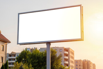 Poster - Advertising billboard mock-up in the city on a sunny summer day