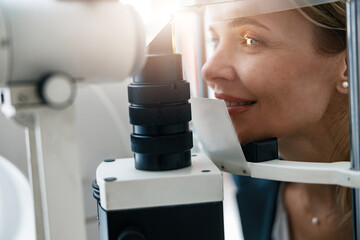 Close up of a patient's vision check at an opticians shop or ophthalmology clinic