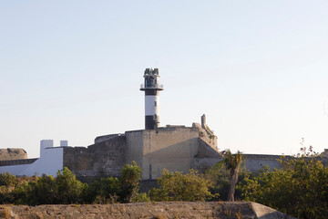 Wall Mural - The lighthouse Shot at the coast of diu vintage fort or Bastion of Diu Fort. It is a sixteenth century fort. built by Portuguese, located in Diu district of Union Territory Daman and Diu, India