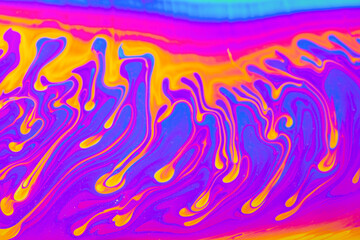 Wall Mural - Psychedelic multicolored background abstract. Rainbow colors. patterns background. Photo macro shot of soap bubbles