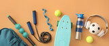 Fototapeta Kawa jest smaczna - Set of sport equipment on color background, top view