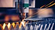 Leinwandbild Motiv Blue steel color Technology plasma industrial. Macro CNC laser machine cutting sheet metal with light spark