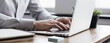 Man hands typing on computer keyboard closeup panoramic banner, businessman or student using laptop at home, online learning, internet marketing, working from home, office workplace, freelance concept