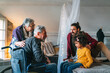 © NDABCREATIVITY - Happy extended multiethnic family having fun and spending time together at home.