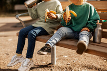 Children Eating At Playground