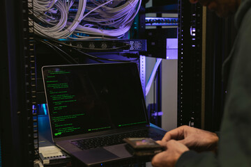 Male programmer working on laptop