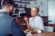 © Dusan Petkovic - Couple eating cake at the restaurant.