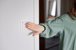 © Johnér - Hand pressing light switch