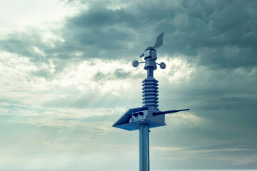 automatic weather station, with a weather monitoring system. against the background of a gray sky wi