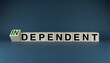 © Prazis Images - Cubes form the words Independent or dependent. The concept of independence in business, international relations and personal life