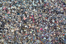 The Texture Of The Landmark Berlin Wall Is Covered With Chewing Gum