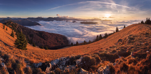 Wall Mural - Morning sun panorama, beautiful fluffy clouds and forest at mount Lysec in Slovakia