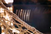 Wooden Winch Of A Sailing Ship And Ropes On The Deck Of Medieval Pirate Warship