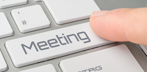 Wall Mural - a keyboard with a labeled button - meeting