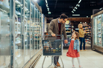 Wall Mural - Dad and daughter talking about shopping