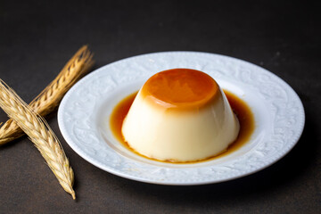 Wall Mural - Cream caramel pudding with caramel sauce in plate