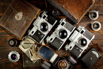 Wall Mural - Old camera in the studio on an old background