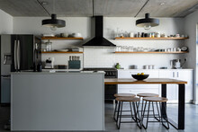 Interior Of Modern Kitchen With Appliances, Utensils And Kitchen Island