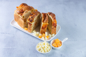 Sticker - 3 cheese braid bread, mozzarella, cheese, yellow cheese displayed on gray background