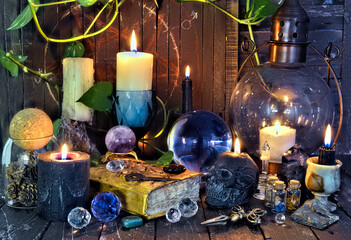 Wall Mural - Wicca, esoteric and occult still life with vintage magic objects on witch table altar for mystic rituals and fortune telling. Halloween and gothic concept