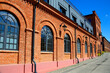 historic spinning mill factory built in 1872, after revitalization it houses modern loft apartments, Ksiezy Mlyn, Tymienieckiego street, Lodz, Poland, Europe
