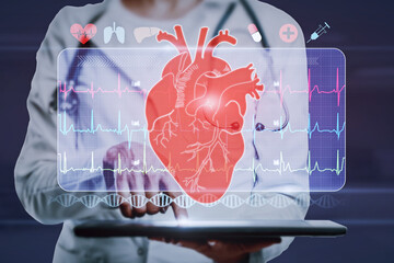 Poster -  hand holding digital pad with abstract glowing medical cardiology interface on blurry hospital background. Hi-tech technology and medicine of the future concept. Double exposure.