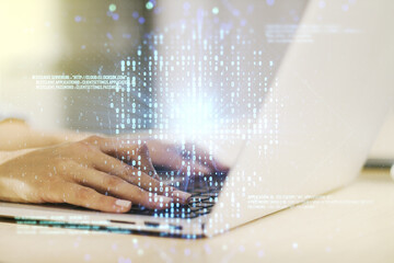 Poster - Creative code skull hologram and hands typing on computer keyboard on background, cybercrime and hacking concept. Multiexposure