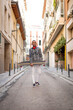 © luisrojasstock - young black man with a cap and a long board on the street
