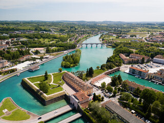 Canvas Print - Aerial view of the city of Peschiera del Garda in the province of Verona in Veneto