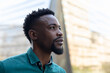 © Wavebreak Media - Close-up of thoughtful african american mid adult businessman standing in office balcony
