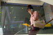 © Wavebreak Media - African american mid adult businesswoman talking on smart phone while moving down steps in office