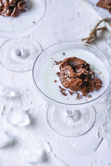 Poster - Vertical shot of chocolate ice cream in glass plate