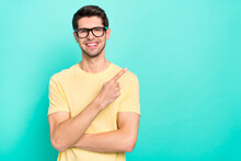 Photo Of Funny Brunet Young Guy Index Promo Wear Eyewear Yellow T-shirt Isolated On Turquoise Color Background