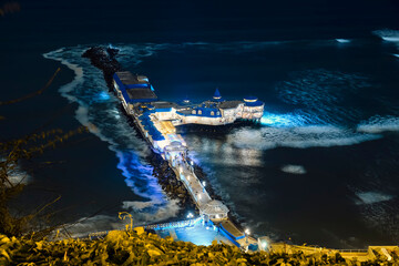 Wall Mural - Pier at night in the ocean. Lima, peru.