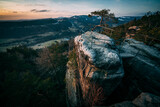 Fototapeta Na ścianę - rocky viewpoint at sunset in the mountains