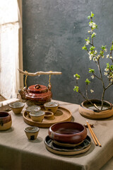 Wall Mural - Asian style table setting with craft tableware