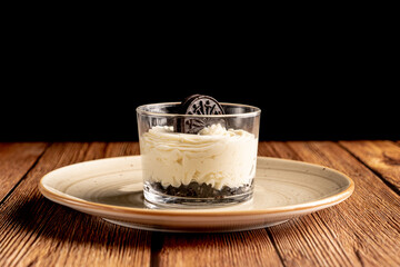 Sticker - Delicious biscuit with mascarpone on a wooden table