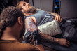 © Mr. Prof - Tattooist create tattoo in studio