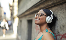 Portrait Of Young Woman While Listening To Music