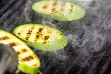 Wall Mural - Grilled zucchini with addition of thyme, lemon zest and garlic